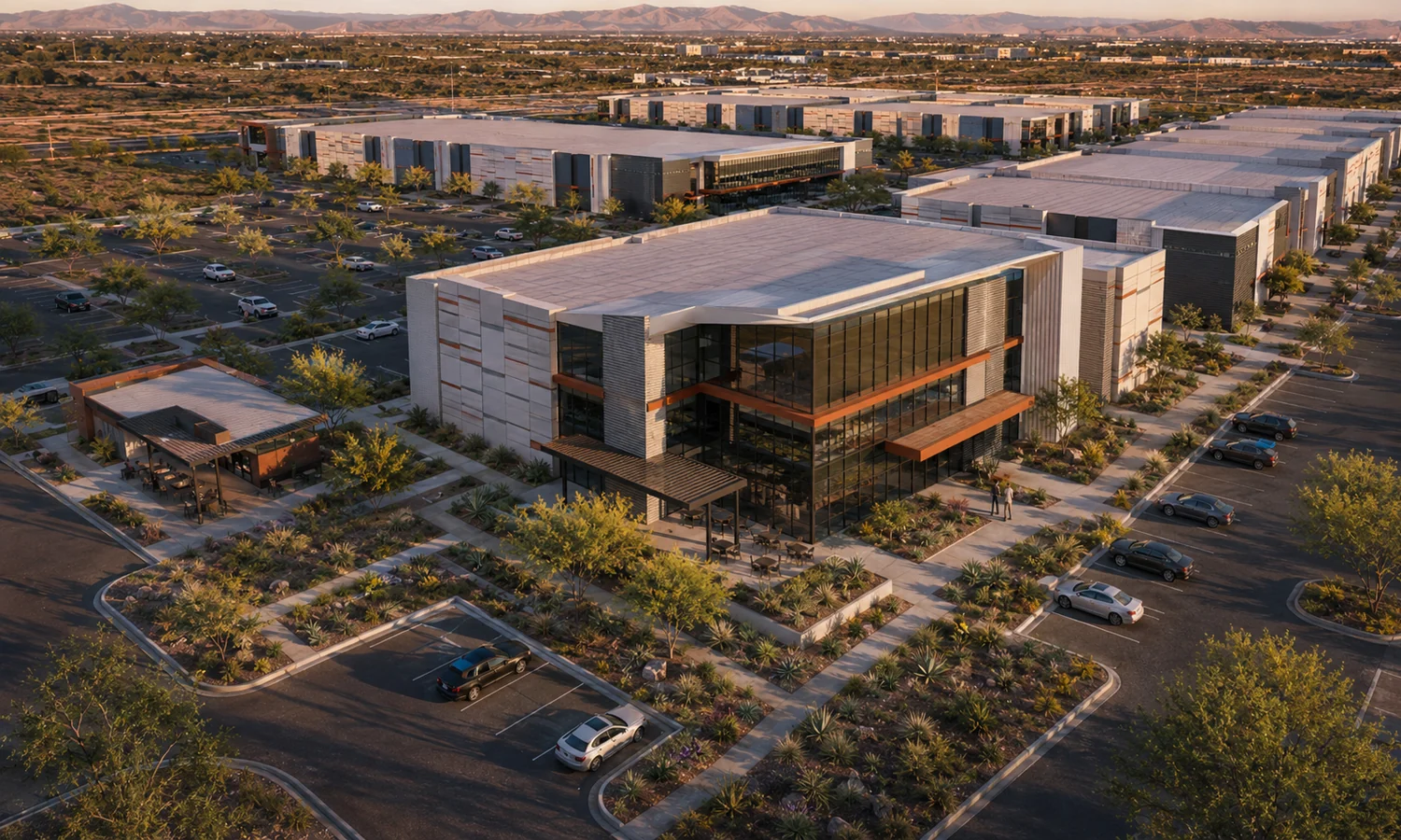 Aerial view at dusk. The multi-building Class A campus across the 270-acre site at Elliot and Sossaman, weighted to manufacturing and technology.