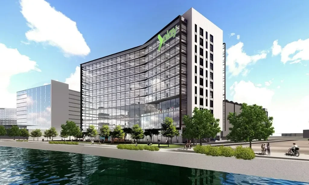 Phase one rising now: three towers of 21 to 23 stories delivering 724 multifamily units and ground-level retail across roughly 1.3 million gross square feet.