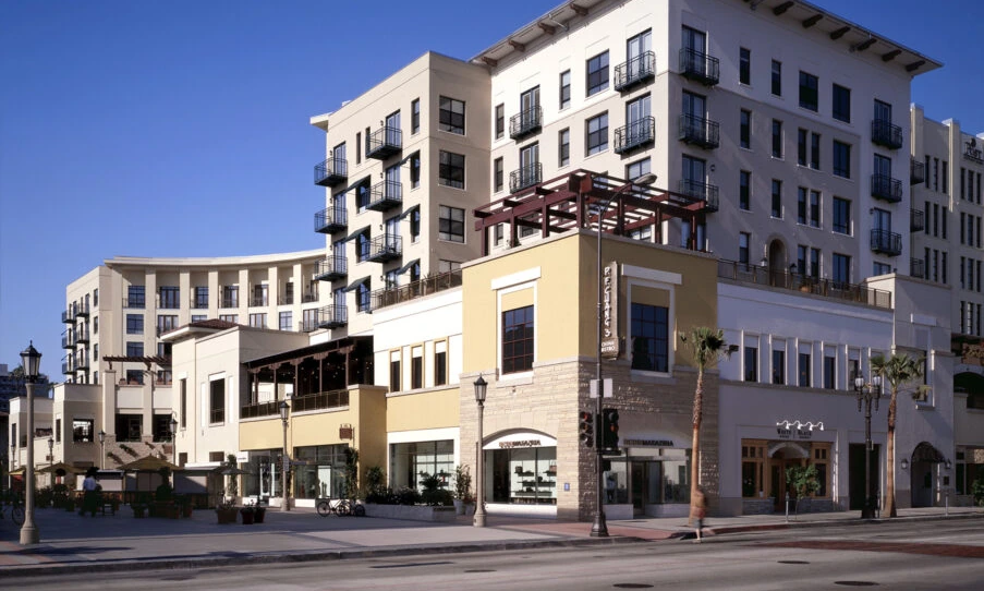 Paseo Colorado Pasadena. Mediterranean-style retail and residential building along the street frontage. Pasadena commercial real estate.